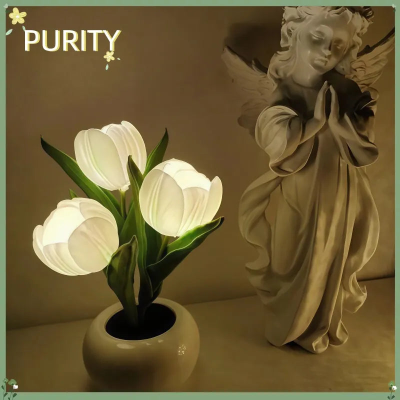White LED tulip lamp with three glowing flower heads in a round white base