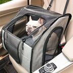 Gray dog car crate on the front passenger seat with a French bulldog inside