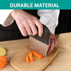 Hand in a black glove cutting a carrot into wavy slices with the crinkle cutter, captioned Durable material.