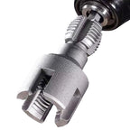 Macro close-up of the threaded tapping head mounted in a drill chuck, on a white background.