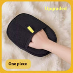 One-piece black mesh hair removal mitt worn on the hand