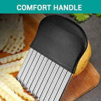 Crinkle cutter resting on a wooden chopping board beside a potato and wavy-cut strips, captioned Comfort handle.