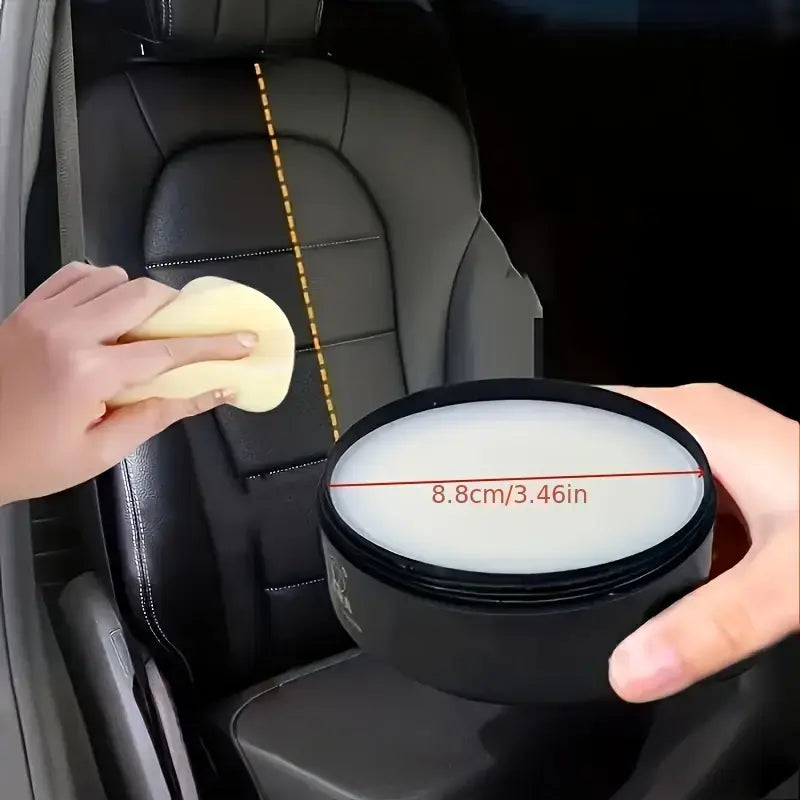 Car leather cleaning cream jar and sponge applicator being used on a leather car seat