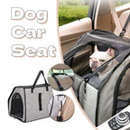 Dog car crate strapped into a car seat with a small dog looking out of the mesh window